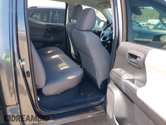 2023 Toyota Tacoma SR with VIN 3TMCZ5AN0PM614127, listed as a IAAI auction lot 41974924 with 12,674 mi miles and . Bid and sale history available at DreamBid. Image 8.