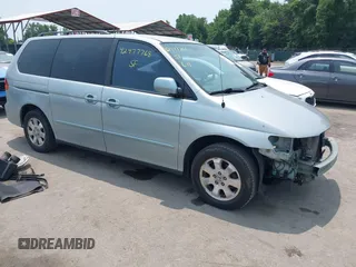 2002 Honda Odyssey EX with VIN 2HKRL18612H587778, listed as a IAAI auction lot 42477768 with 279,574 mi miles and . Bid and sale history available at DreamBid. Image 1.