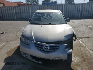 2005 Mazda 3 s with VIN JM1BK123051308514, listed as a Copart auction lot 51306365 with 185,771 mi miles and Salvage Title. Bid and sale history available at DreamBid. Image 5.