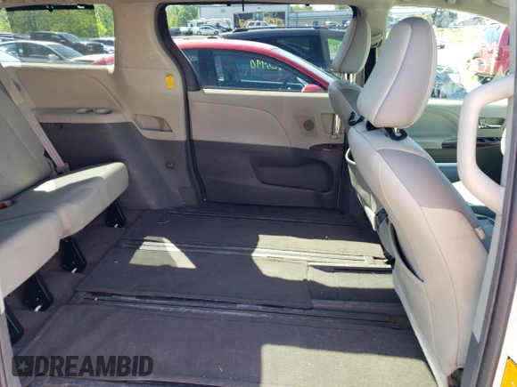 2014 Toyota Sienna XLE with VIN 5TDYK3DC6ES427920, listed as a Copart auction lot 54075594 with 127,018 mi miles and Salvage title. Bid and sale history available at DreamBid. Image 11.