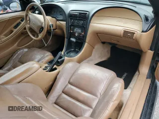 1998 Ford Mustang GT with VIN 1FAFP45XXWF160692, listed as a Copart auction lot 47210885 with 180,035 mi miles and Salvage Title. Bid and sale history available at carsss.com. Image 8.
