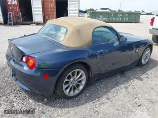 2004 BMW Z4 2.5i with VIN 4USBT33594LR68458, listed as a IAAI auction lot 41873219 with 113,587 mi miles. Bid and sale history available at carsss.com. Image 4.
