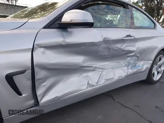 2015 BMW 4 Series 428i with VIN WBA3N7C52FK222743, listed as a IAAI auction lot 41602525 with 81,661 mi miles and . Bid and sale history available at DreamBid. Image 6.