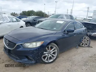 2017 Mazda Mazda6 Touring with VIN JM1GL1V54H1107722, listed as a IAAI auction lot 41521257 with 142,129 mi miles. Bid and sale history available at carsss.com. Image 2.