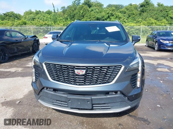 2021 Cadillac XT4 FWD Premium Luxury with VIN 1GYFZCR42MF007617, listed as a IAAI auction lot 42437974 with 126,071 mi miles and . Bid and sale history available at DreamBid. Image 12.