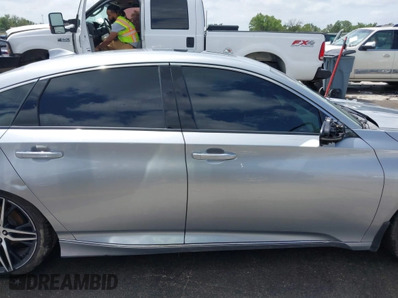 2020 Honda Accord Touring with VIN 1HGCV2F96LA018714, listed as a IAAI auction lot 42084295 with 74,861 mi miles and . Bid and sale history available at DreamBid. Image 14.