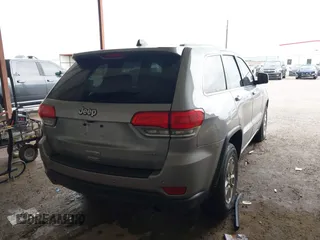 2018 Jeep Grand Cherokee Laredo E with VIN 1C4RJEAG1JC275356, listed as a IAAI auction lot 42150422 with 69,720 mi miles and . Bid and sale history available at DreamBid. Image 4.