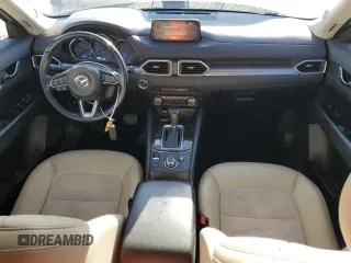 2017 Mazda CX-5 Touring with VIN JM3KFBCL2H0204097, listed as a Copart auction lot 88173195 with 76,884 mi miles and Salvage Title. Bid and sale history available at carsss.com. Image 8.