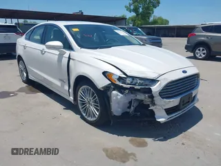 2014 Ford Fusion SE Hybrid with VIN 3FA6P0LUXER233658, listed as a IAAI auction lot 42311588 with 106,282 mi miles and . Bid and sale history available at DreamBid. Image 1.