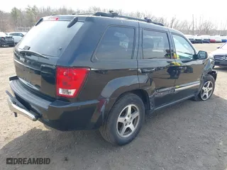 2006 Jeep Grand Cherokee Laredo with VIN 1J4HR48N76C265919, listed as a IAAI auction lot 41738435 with 133,286 mi miles. Bid and sale history available at carsss.com. Image 4.