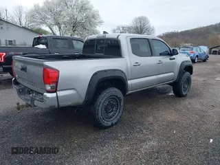 2016 Toyota Tacoma SR with VIN 5TFCZ5AN2GX012937, listed as a IAAI auction lot 41963728 with 157,397 mi miles and . Bid and sale history available at DreamBid. Image 4.