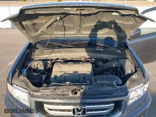 2010 Honda Ridgeline RTS with VIN 5FPYK1F49AB013790, listed as a IAAI auction lot 41769454 with 139,682 mi miles. Bid and sale history available at carsss.com. Image 10.