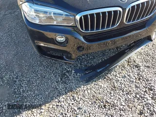 2017 BMW X5 sDrive35i with VIN 5UXKR2C3XH0X06113, listed as a IAAI auction lot 41951474 with 139,420 mi miles. Bid and sale history available at carsss.com. Image 6.