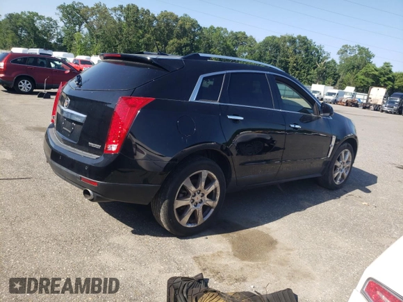 2011 Cadillac SRX Premium Collection with VIN 3GYFNFEYXBS547540, listed as a Copart auction lot 62563895 with 107,136 mi miles and Salvage title. Bid and sale history available at DreamBid. Image 3.