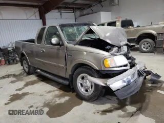 2003 Ford F-150 XL with VIN 1FTRX17W63NB22887, listed as a Copart auction lot 47218115 with 0 mi miles and Salvage Title. Bid and sale history available at carsss.com. Image 4.