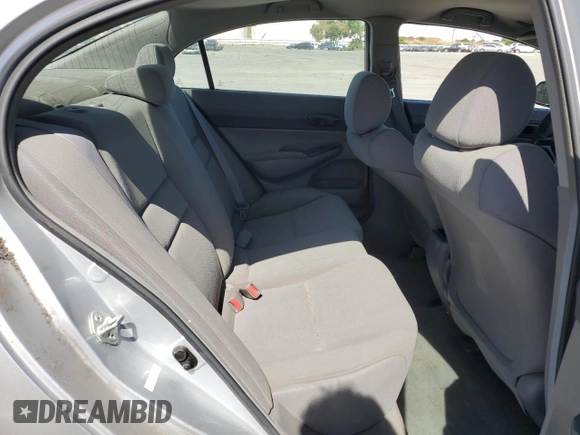 2010 Honda Civic DX-VP z VIN 19XFA1F32AE080022, wystawiony jako Copart lot #57983445 z przebiegiem 154 065 mil mil oraz Szkoda całkowita • Salvage title. Historia ofert i sprzedaży dostępna na DreamBid. Obrazek 10.