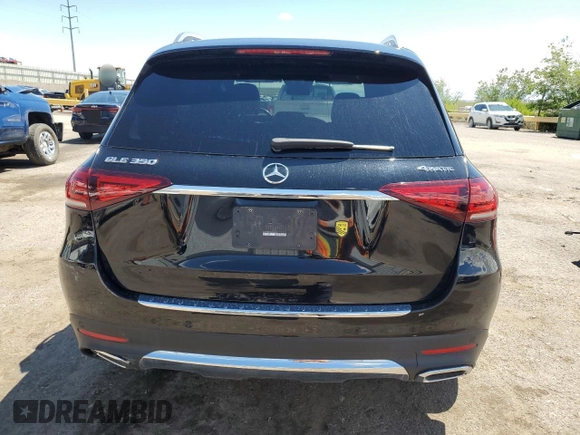 2021 Mercedes-Benz GLE 350 with VIN 4JGFB4KB0MA410674, listed as a Copart auction lot 56299965 with 58,675 mi miles and Salvage title. Bid and sale history available at DreamBid. Image 6.