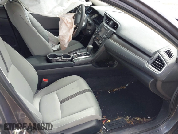 2019 Honda Civic LX with VIN 19XFC2F61KE037495, listed as a IAAI auction lot 41891007 with 90,262 mi miles and . Bid and sale history available at DreamBid. Image 5.