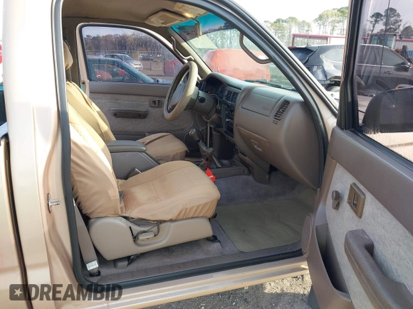 1999 Toyota Tacoma with VIN 4TAPM62NXXZ439318, listed as a IAAI auction lot 41721442 with 299,876 mi miles and . Bid and sale history available at DreamBid. Image 5.