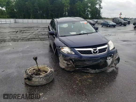 2011 Mazda CX-9 Grand Touring with VIN JM3TB2DA0B0320628, listed as a Copart auction lot 56310725 with 119,068 mi miles and Salvage title. Bid and sale history available at DreamBid. Image 14.