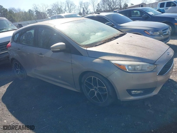 2015 Ford Focus SE with VIN 1FADP3K27FL247736, listed as a IAAI auction lot 41739772 with 149,165 mi miles. Bid and sale history available at carsss.com. Image 1.