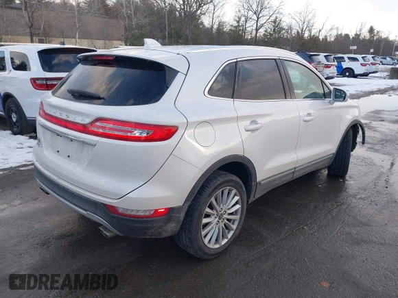 2019 Lincoln MKC Standard with VIN 5LMCJ1D91KUL26077, listed as a IAAI auction lot 41455499 with 55,782 mi miles. Bid and sale history available at carsss.com. Image 4.