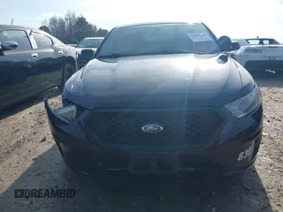 2014 Ford Police Interceptor with VIN 1FAHP2MK0EG148689, listed as a IAAI auction lot 41057241 with 124,703 mi miles and . Bid and sale history available at DreamBid. Image 12.