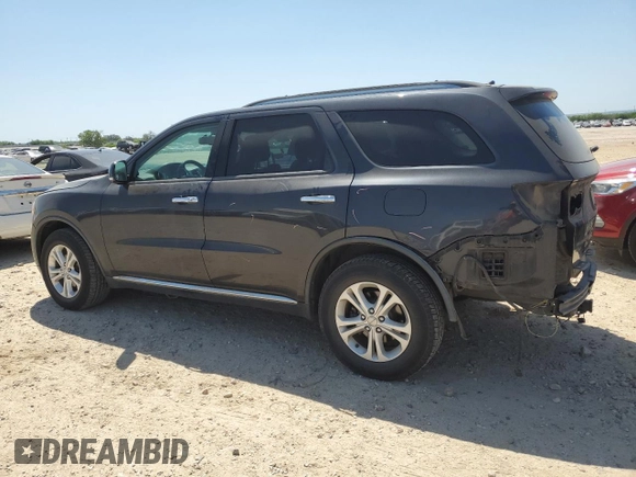 2013 Dodge Durango Crew with VIN 1C4RDJDG5DC686680, listed as a Copart auction lot 51952575 with 217,713 mi miles and Salvage Title. Bid and sale history available at carsss.com. Image 2.