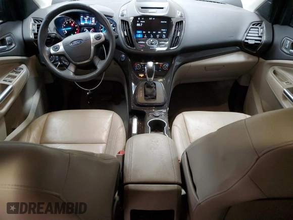 2016 Ford Escape Titanium with VIN 1FMCU9J95GUC57205, listed as a Copart auction lot 71033934 with 90,477 mi miles and Salvage Title. Bid and sale history available at DreamBid. Image 8.