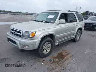 1999 Toyota 4Runner Limited with VIN JT3GN87R6X0130527, listed as a IAAI auction lot 40774553 with 406,958 mi miles and . Bid and sale history available at DreamBid. Image 2.