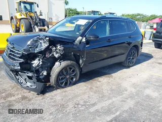 2024 Volkswagen Tiguan SE with VIN 3VVNB7AXXRM199400, listed as a IAAI auction lot 42216941 with 11,581 mi miles and . Bid and sale history available at DreamBid. Image 2.