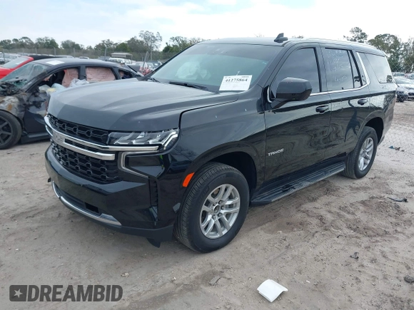 2023 Chevrolet Tahoe LS with VIN 1GNSCMKD2PR290181, listed as a IAAI auction lot 41275864 with 16,135 mi miles and . Bid and sale history available at DreamBid. Image 2.