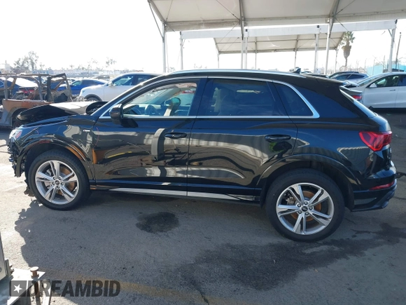 2021 Audi Q3 S line Premium Plus z VIN WA1EECF37M1095208, wystawiony jako IAAI lot #41616320 z przebiegiem 18 341 mil mil oraz . Historia ofert i sprzedaży dostępna na DreamBid. Obrazek 14.