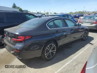 2023 BMW 5 Series 530e with VIN WBA13AG00PCL24045, listed as a Copart auction lot 84961634 with Not provided miles and Salvage title. Bid and sale history available at DreamBid. Image 3.