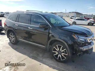 2022 Honda Pilot Touring 7-Passenger с VIN 5FNYF5H64NB003094, выставлен на аукционе Copart как лот 43207155 с пробегом 34 394 миль миль и Списание • Salvage title. История ставок и продаж доступна на DreamBid. Изображение 4.