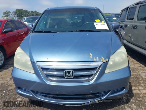 2006 Honda Odyssey EX z VIN 5FNRL38476B120251, wystawiony jako IAAI lot #42128586 z przebiegiem 171 372 mil mil oraz . Historia ofert i sprzedaży dostępna na DreamBid. Obrazek 6.