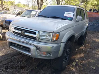 2000 Toyota 4Runner Limited z VIN JT3HN87R6Y9037203, wystawiony jako IAAI lot #42048560 z przebiegiem 245 375 mil mil oraz . Historia ofert i sprzedaży dostępna na DreamBid. Obrazek 2.