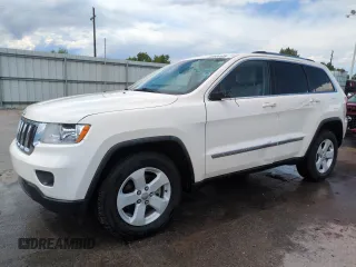2011 Jeep Grand Cherokee Laredo with VIN 1J4RR4GG0BC522162, listed as a Copart auction lot 60660125 with 114,664 mi miles and Salvage title. Bid and sale history available at DreamBid. Image 1.