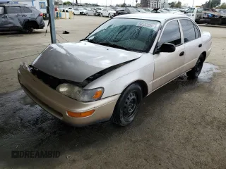 1997 Toyota Corolla with VIN 1NXBA02E8VZ593777, listed as a Copart auction lot 54137255 with 174,197 mi miles and Salvage title. Bid and sale history available at DreamBid. Image 1.