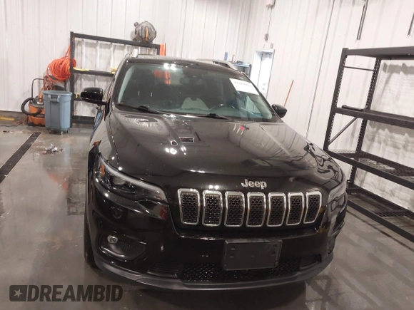 2021 Jeep Cherokee Latitude Lux with VIN 1C4PJMMX2MD107902, listed as a IAAI auction lot 41229913 with 61,195 mi miles and . Bid and sale history available at DreamBid. Image 12.