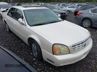 2003 Cadillac DeVille z VIN 1G6KD54Y03U269867, wystawiony jako IAAI lot #42198363 z przebiegiem Nie podano mil oraz . Historia ofert i sprzedaży dostępna na DreamBid. Obrazek 1.