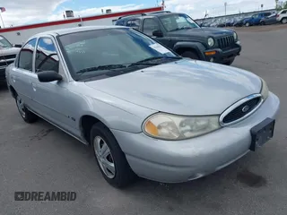 2000 Ford Contour SE Fleet z VIN 1FAFP66LXYK134000, wystawiony jako IAAI lot #42148527 z przebiegiem 163 119 mil mil oraz . Historia ofert i sprzedaży dostępna na DreamBid. Obrazek 1.