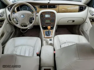 2002 Jaguar X-Type with VIN SAJEA51C02WC20249, listed as a Copart auction lot 69661244 with 97,184 mi miles and Clean Title. Bid and sale history available at carsss.com. Image 8.