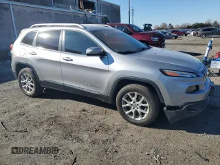 2014 Jeep Cherokee Altitude with VIN 1C4PJMCS9EW232388, listed as a Copart auction lot 82842674 with 169,458 mi miles and Salvage Title. Bid and sale history available at carsss.com. Image 4.