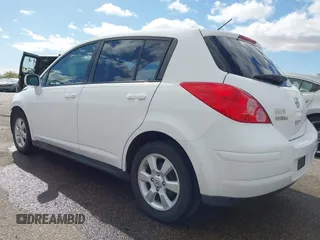 2009 Nissan Versa 1.8 S with VIN 3N1BC13E19L371006, listed as a IAAI auction lot 42064633 with 67,424 mi miles. Bid and sale history available at carsss.com. Image 3.