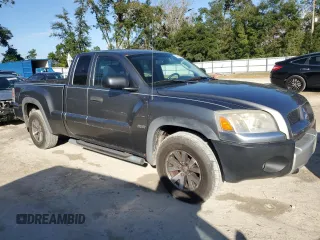2006 Mitsubishi Raider Duro Cross z VIN 1Z7HT32N96S547869, wystawiony jako Copart lot #78606754 z przebiegiem 123 726 mil mil oraz Czysty tytuł • Clean title. Historia ofert i sprzedaży dostępna na DreamBid. Obrazek 4.