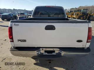 2000 Ford F-150 XL with VIN 1FTRX17L1YNA26050, listed as a Copart auction lot 43597105 with 205,152 mi miles and Salvage Title. Bid and sale history available at carsss.com. Image 6.