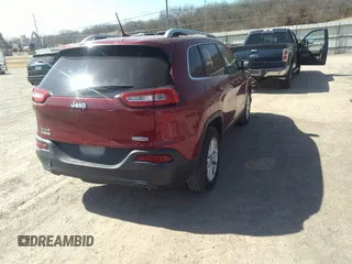 2014 Jeep Cherokee Latitude with VIN 1C4PJMCS7EW229179, listed as a IAAI auction lot 41793922 with 137,042 mi miles. Bid and sale history available at carsss.com. Image 4.