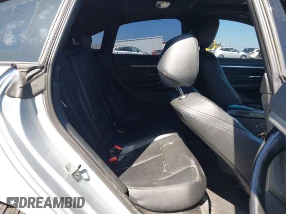 2015 BMW 4 Series 428i xDrive with VIN WBA4C9C54FD330582, listed as a IAAI auction lot 42135691 with 127,289 mi miles and . Bid and sale history available at DreamBid. Image 8.