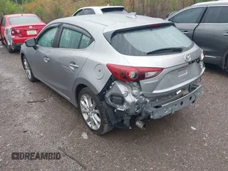 2014 Mazda 3 S Touring with VIN JM1BM1L30E1187539, listed as a IAAI auction lot 41974709 with 111,189 mi miles and . Bid and sale history available at DreamBid. Image 3.